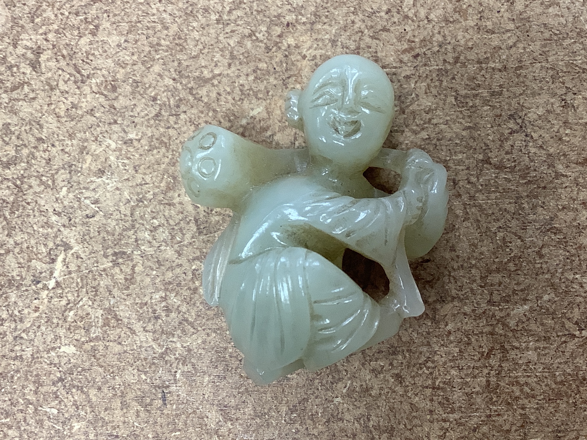 Assorted Chinese items including a jade figure, a jadeite pendant, pewter dish etc.